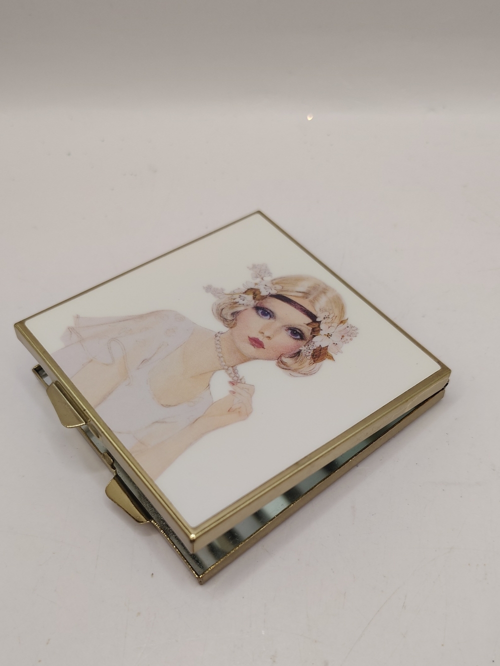 Vintage Makeup Mirror Compact Featuring An Art Deco-Style Flapper Girl